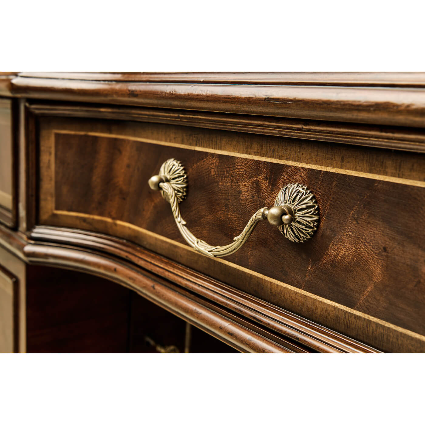 Close-up of drawer handles on Georgian style desk.