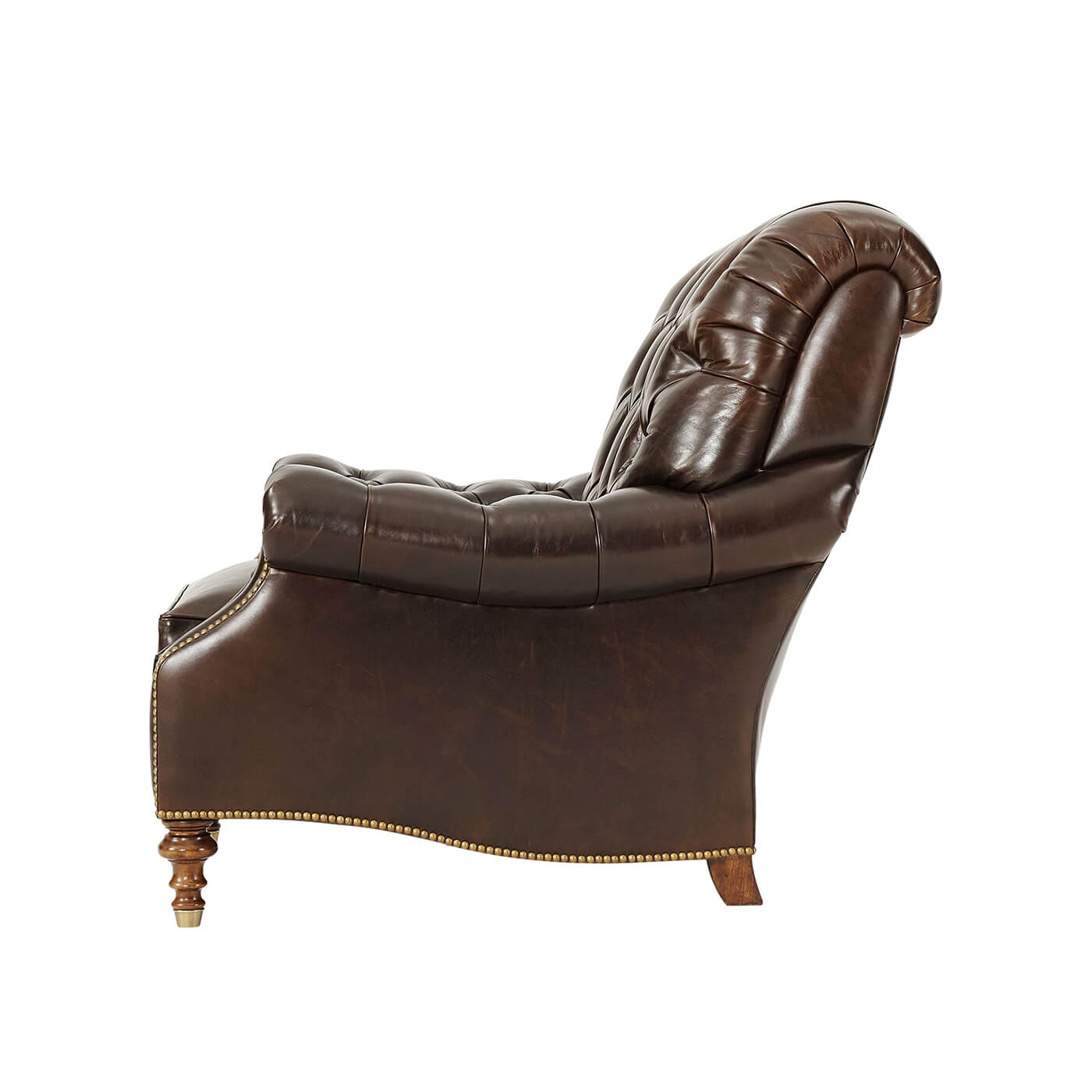 Side profile of leather club chair, curved backrest.