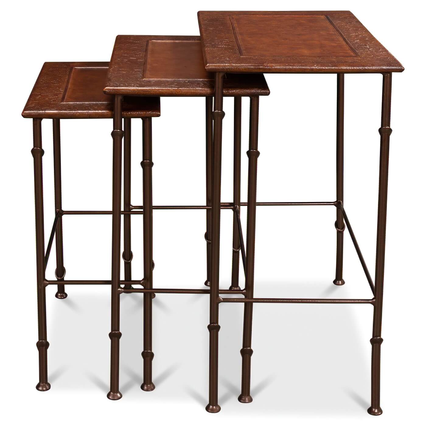 Side view of modern leather-top nesting tables.
