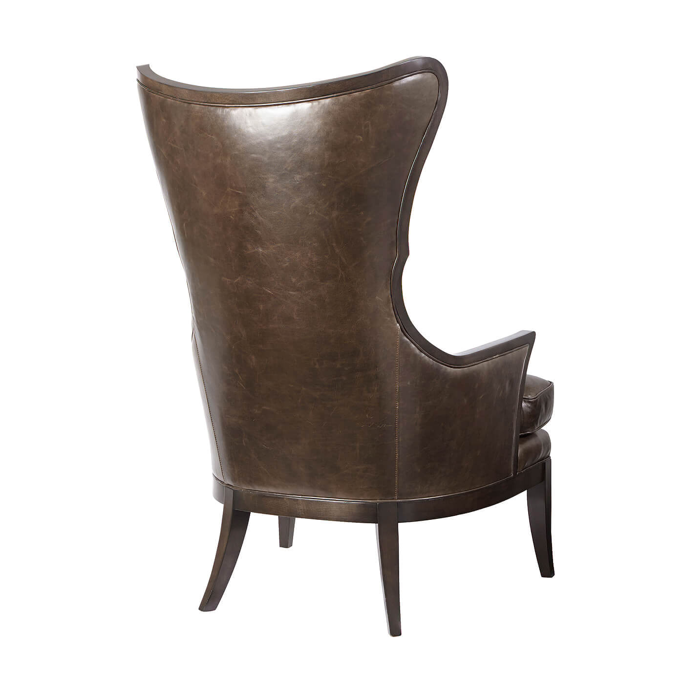 Modern upholstered wingback chair, rear three-quarter view.