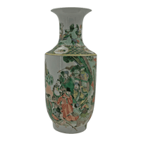 Close-up of detailed Famille Verte vase with figures.