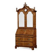 Queen Anne walnut secretary bookcase closed with mirrored doors.