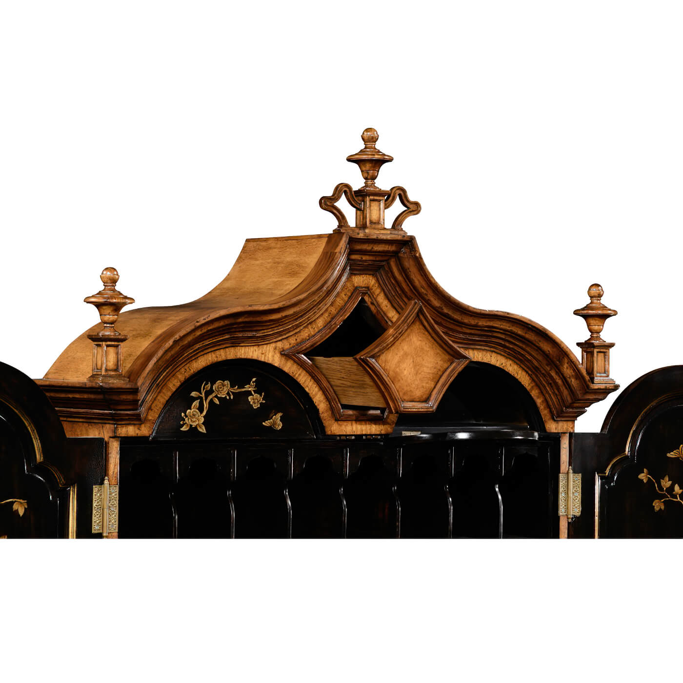 Close-up ornate top of walnut secretary desk.