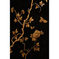 Close-up floral design on secretary desk.
