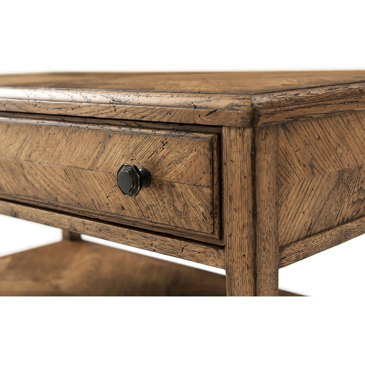 Rustic oak bedside table, close-up of drawer knob.
